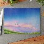 Glass Cutting Board - Pastel Sunrise Landscape with Flying Birds
